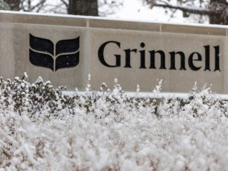 Grinnell sign with snow