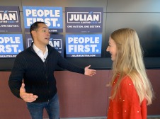 Julian offering hug to student