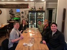 Photo of group at dinner table 