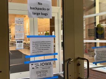 Two glass doors with taped paper to them