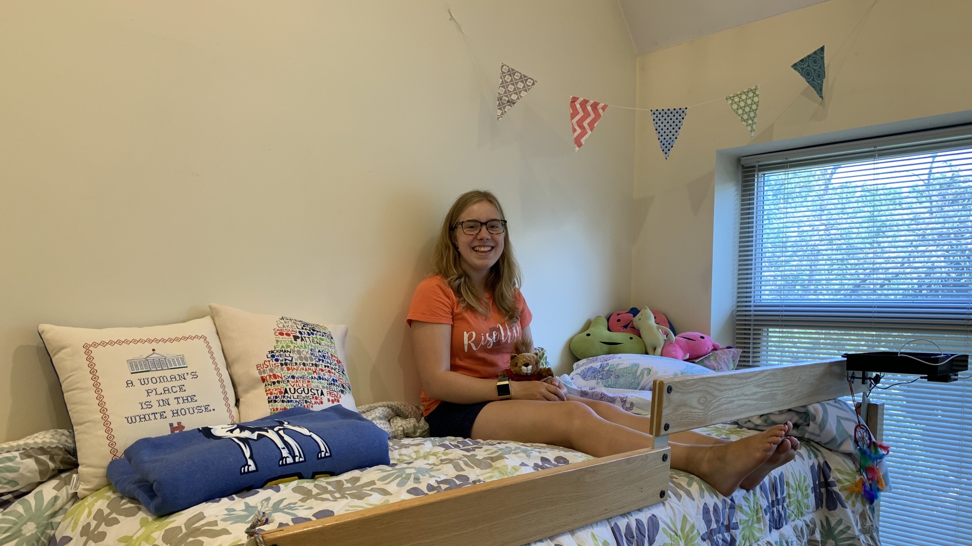 Me sitting in my dorm room bed for the first time