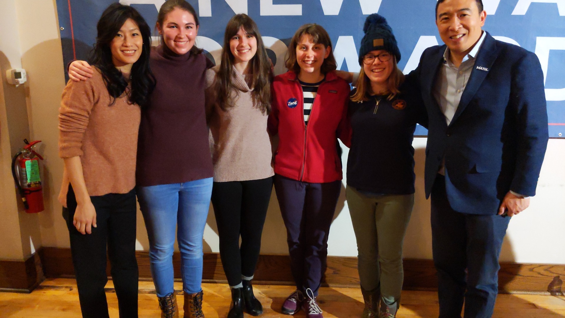MJ and friends in a photo with Andrew Yang