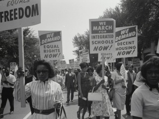 Women and men marching for equal rights