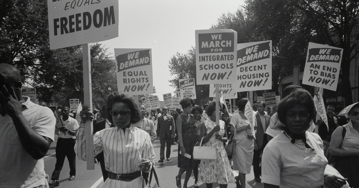 Women and men marching for equal rights