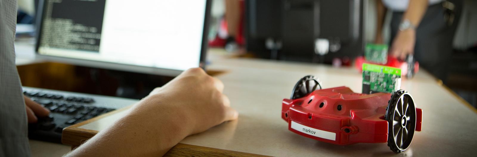 Student works on code in robotics lab
