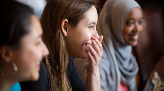 Student's laughing while dining